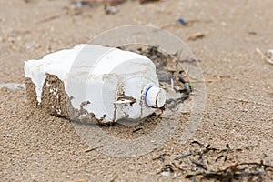 Plastic bottle litter on the beach