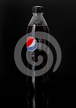Plastic bottle of Pepsi Cola MAX 0.5 liters on a black background. Zero calories Pepsi soft drink bottle isolated on black