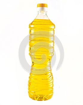 Plastic bottle of sunflower oil isolated on white background.