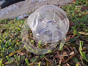 Plastic bottle wasted on the grass