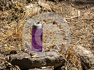 Bottle of water on the ground