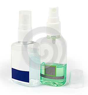 Plastic bottles of antiseptics on a white background