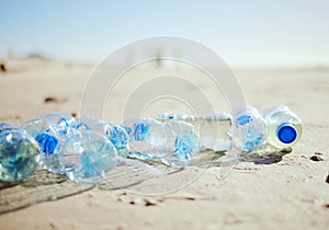 Plastic bottles, beach sand or litter in recycling volunteering, global warming sustainability or earth community