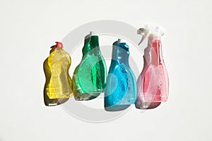 Plastic bottles of cleaning fluids