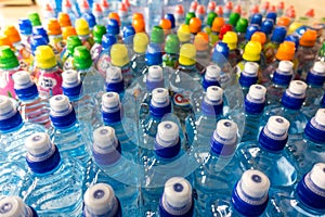 Plastic bottles, colorful caps.