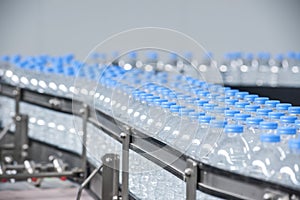 Plastic bottles on conveyor belt