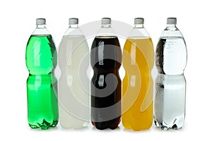 Plastic bottles with different soda isolated on white background