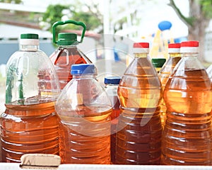 Plastic bottles filled with oil