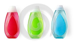 Plastic bottles of liquid laundry detergent,