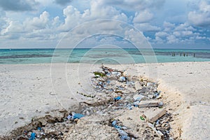 Plastic bottles and rubbish at the tropical beach