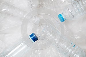 Plastic bottles stack to recycle on white background