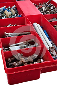 Plastic box for small ironware. Nails, screws, dowels. on white background photo