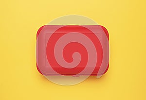 Plastic box on a yellow