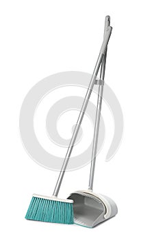 Plastic broom and dustpan on white background