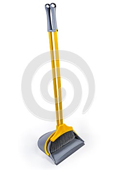 Plastic broom for sweeping floors with dustpan on white background