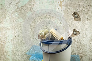 Plastic bucket with construction tools. Renovation concept.
