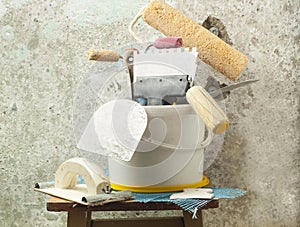 Plastic bucket with construction tools. Renovation concept.