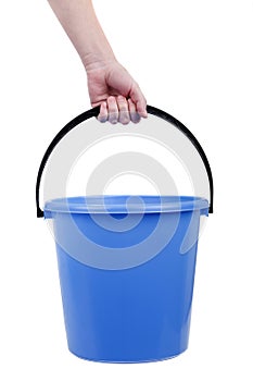 Plastic bucket in hand