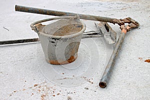 Plastic bucket and pliers cutting