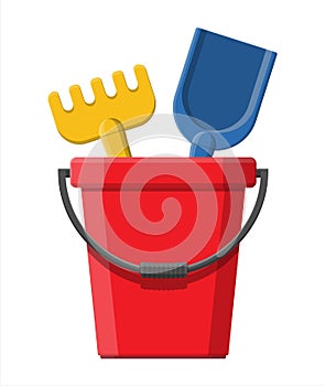 Plastic bucket with rake and shovel