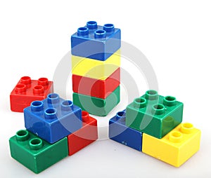 Plastic building blocks isolated on white background