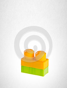 Plastic building blocks or Lego blocks on a background.