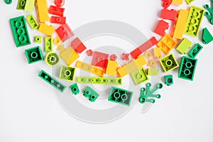 Plastic building blocks pattern on white background, Colorful toy bricks for kid, Top view.Educational and creative toys