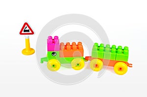 Plastic building blocks on white background