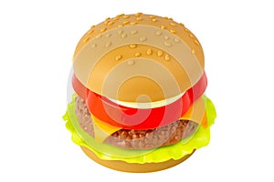 Plastic burger isolated on white background. Plastic cheeseburger. Food is a surrogate. Isolate on a white background.