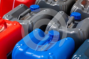 Plastic canisters different color in the warehouse