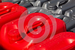 Plastic canisters different color in the warehouse