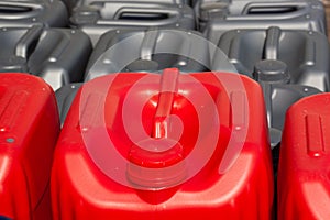 Plastic canisters different color in the warehouse