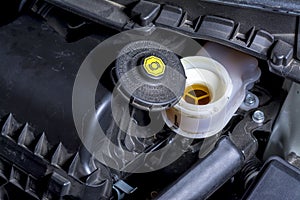 Plastic cap with warning instructions brake fluid reservoir photo