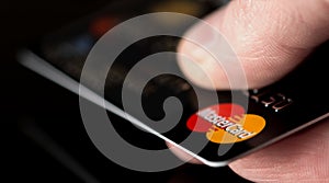 Mastercard in hand