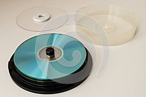 Plastic CD and DVD container on white background. Technology from the 90s