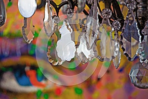 Plastic chandelier in a colourful and fashion filled room