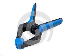 Plastic clamp tool on white background