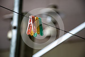 Plastic cloth hanger clip hanging on steel wire