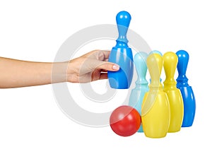 Plastic colored skittles for bowling game. Kids toy