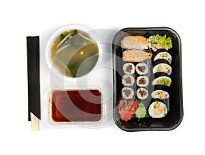 Plastic container with sushi set ready for takeout delivery