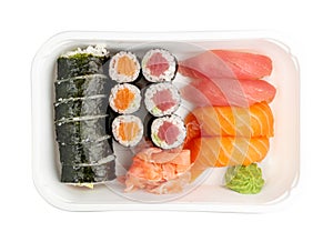 Plastic container with sushi set ready for takeout delivery