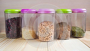 Plastic containers with cereals. Home storage products.