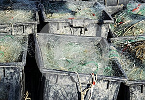 Plastic crates filled with fishing nets