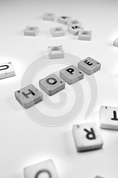 Plastic cube with letters, hope word