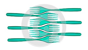 Plastic cutlery forks in green colors on a white background