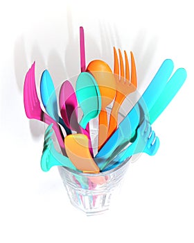 Plastic cutlery in a glass