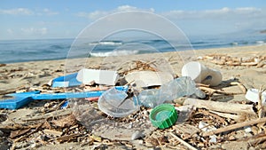 Plastic debris waste pollution trashed on sea coast ecosystem,environment nature contamination