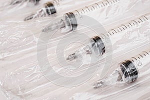 Plastic disposable syringes in a blister pack