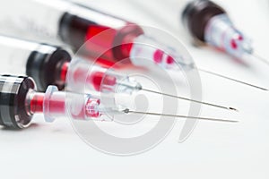 Plastic disposable syringes