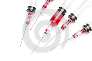 Plastic disposable syringes in a cut out view